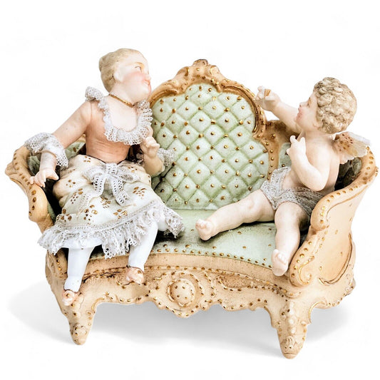 Antique Meissen Porcelain Woman with Cherub on Sofa Figurine